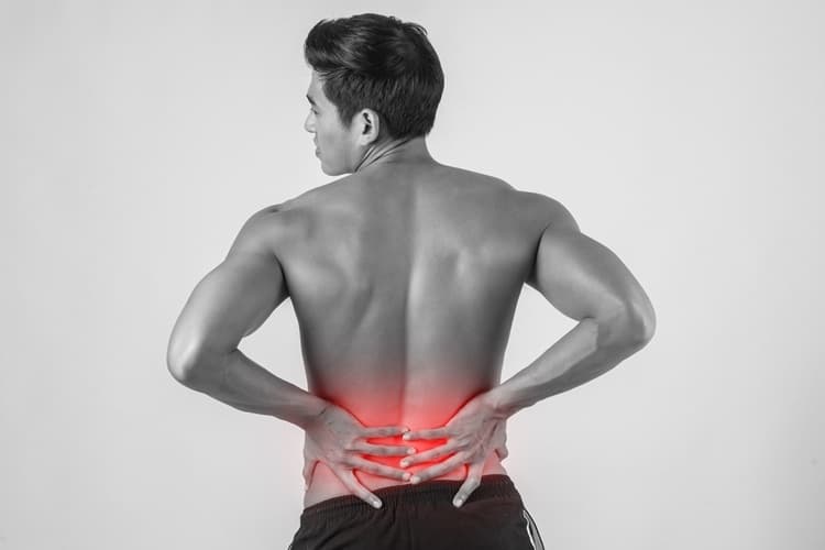 Patient receiving physiotherapy treatment for back pain